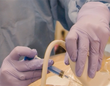 Student injecting medication