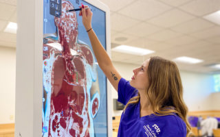 Nursing student in lab