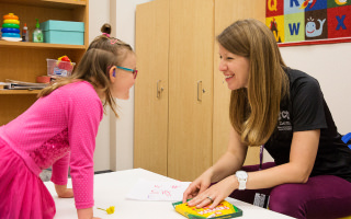 Faculty and student in classroom